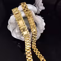 ست دستبند رولکس پلاک دار طلایی،دستبند رولکس ست،دستبند ست رولکس،دستبند ولنتاین رولکس،ست زوجی دستبند 