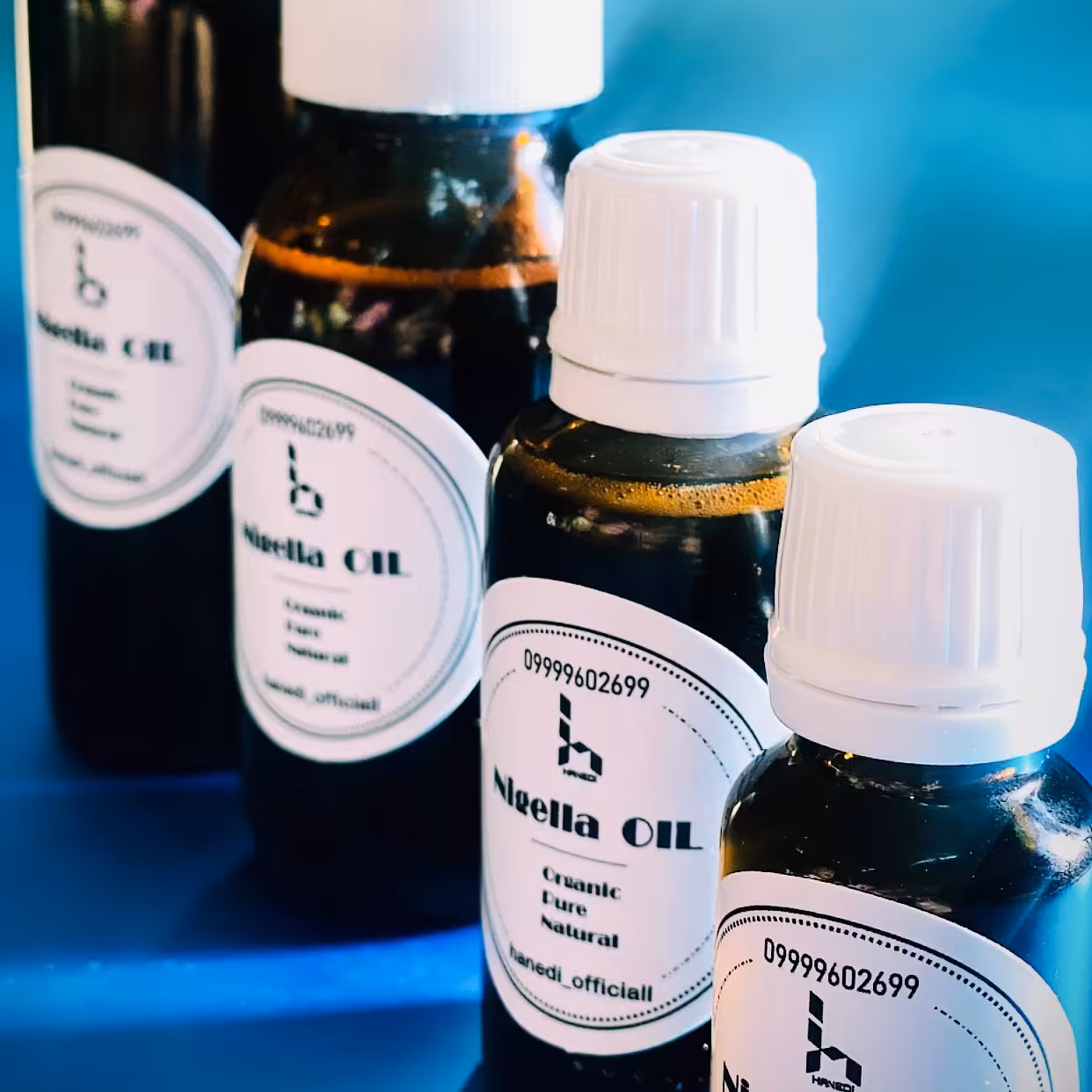 پکیج روغن سیاهدانه 250 میل و روغن سیاهدانه یک لیتر و روغن بادام تلخ 100 میل