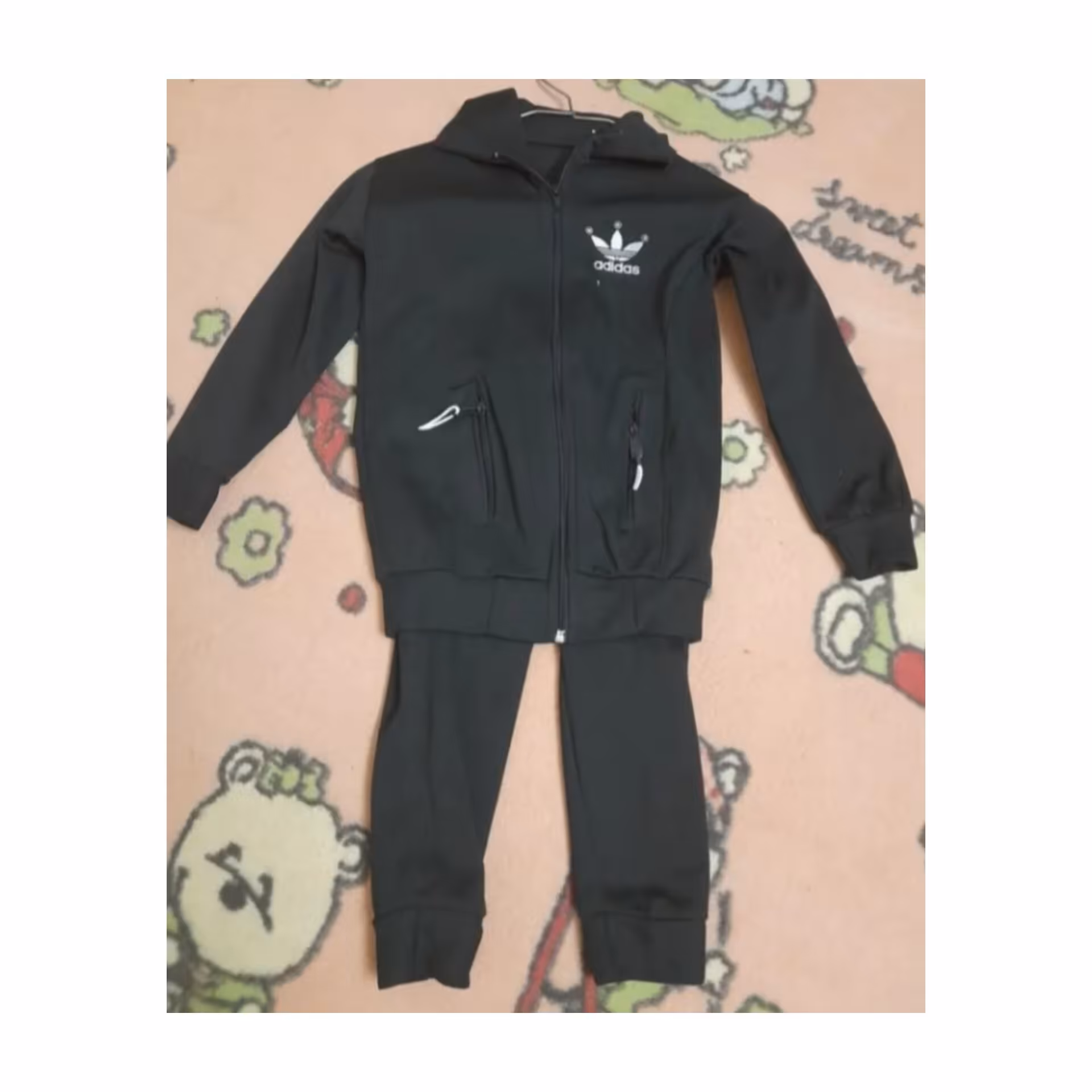 ست ورزشی کاپشن شلوار پسرانه و دخترانه شلوار قد70و کاپشن سایز50 برای سنین 4تا6سال مشکی