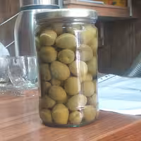 ترشی زیتون شیشه ی یک کیلویی با کیفیت و مرغوبیت عالی 