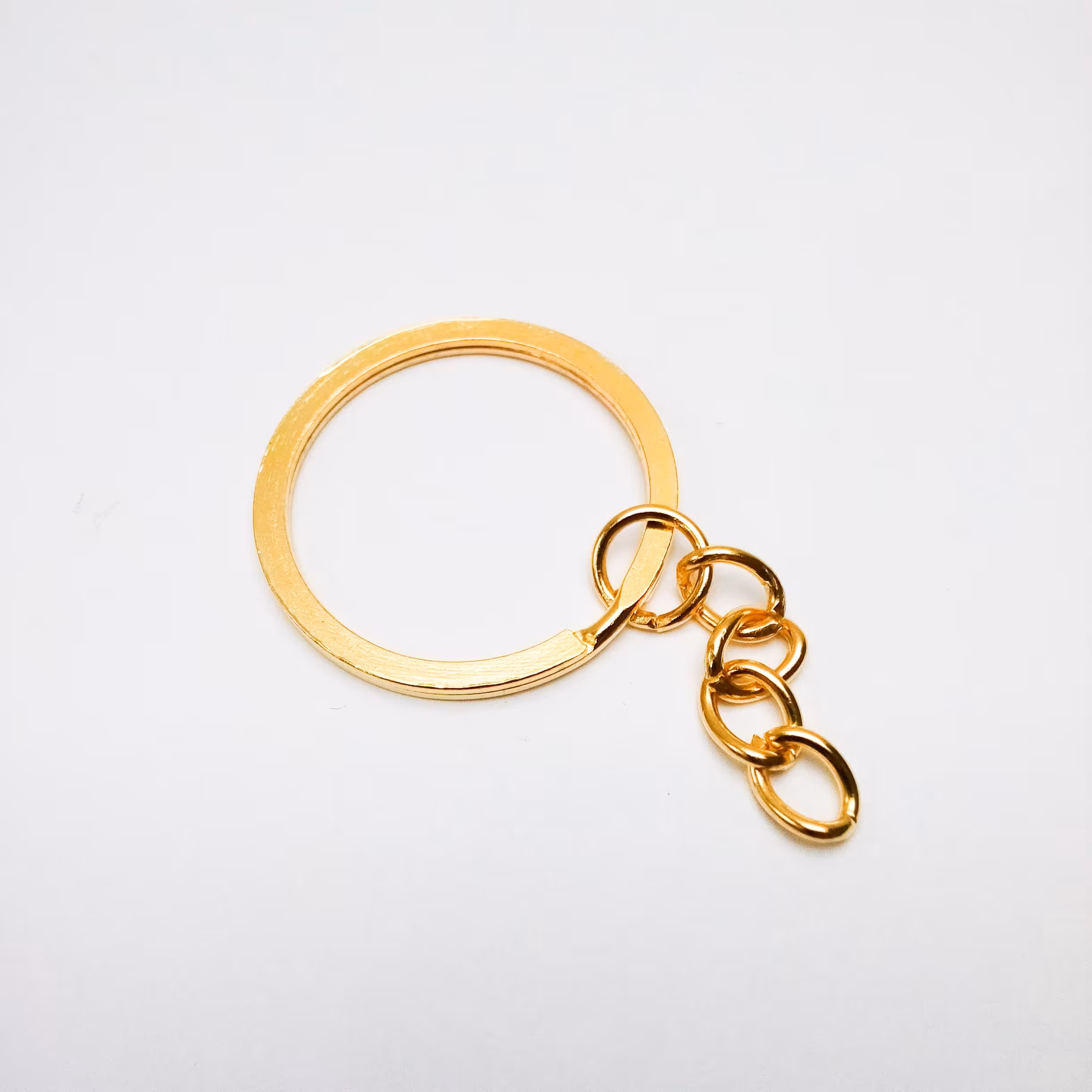 حلقه دسته کلید زنجیر دار طلایی (بسته 5 عددی)