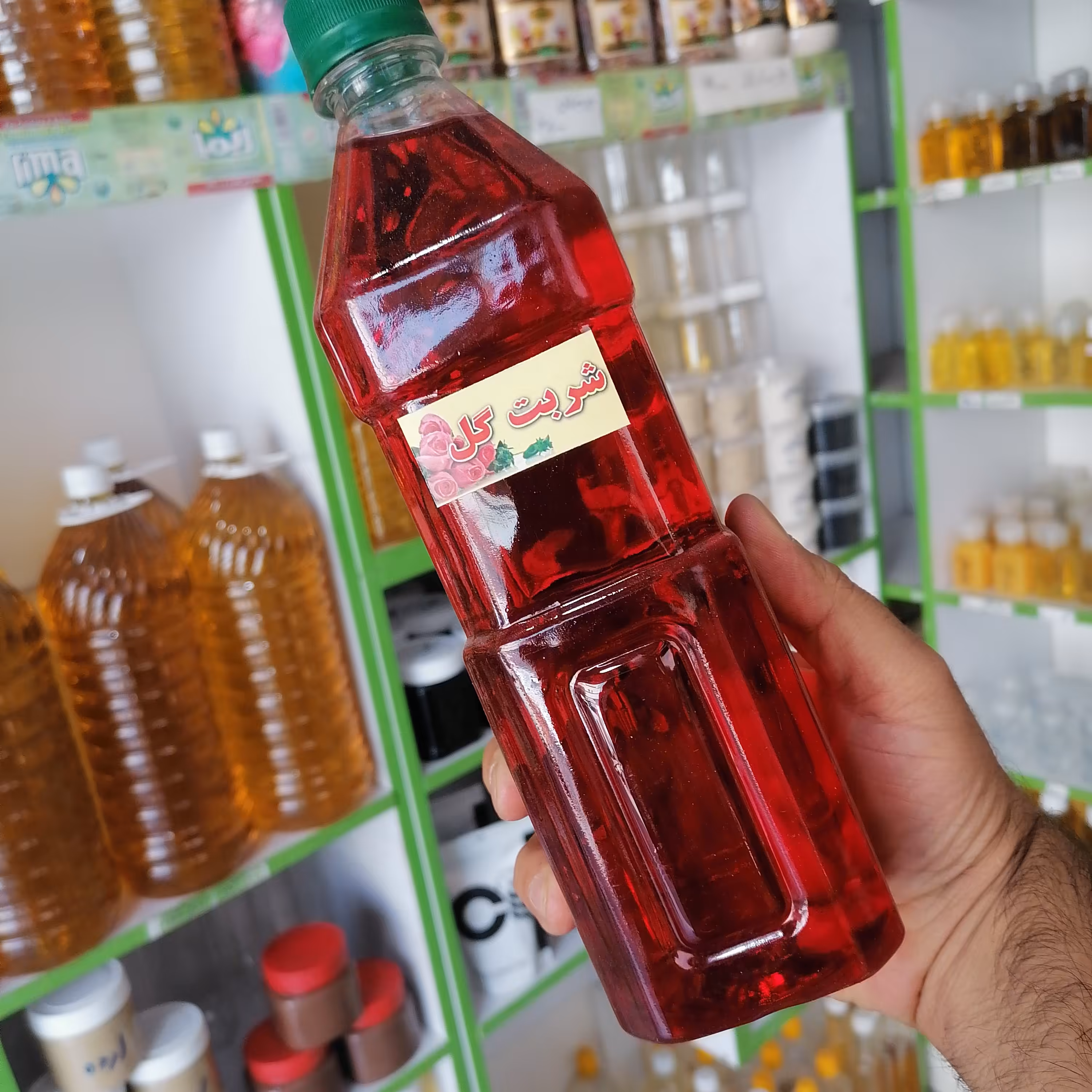 شربت گل محمدی دست ساز کاملا طبیعی و بدون افزودنی یک کیلو و صد گرمی