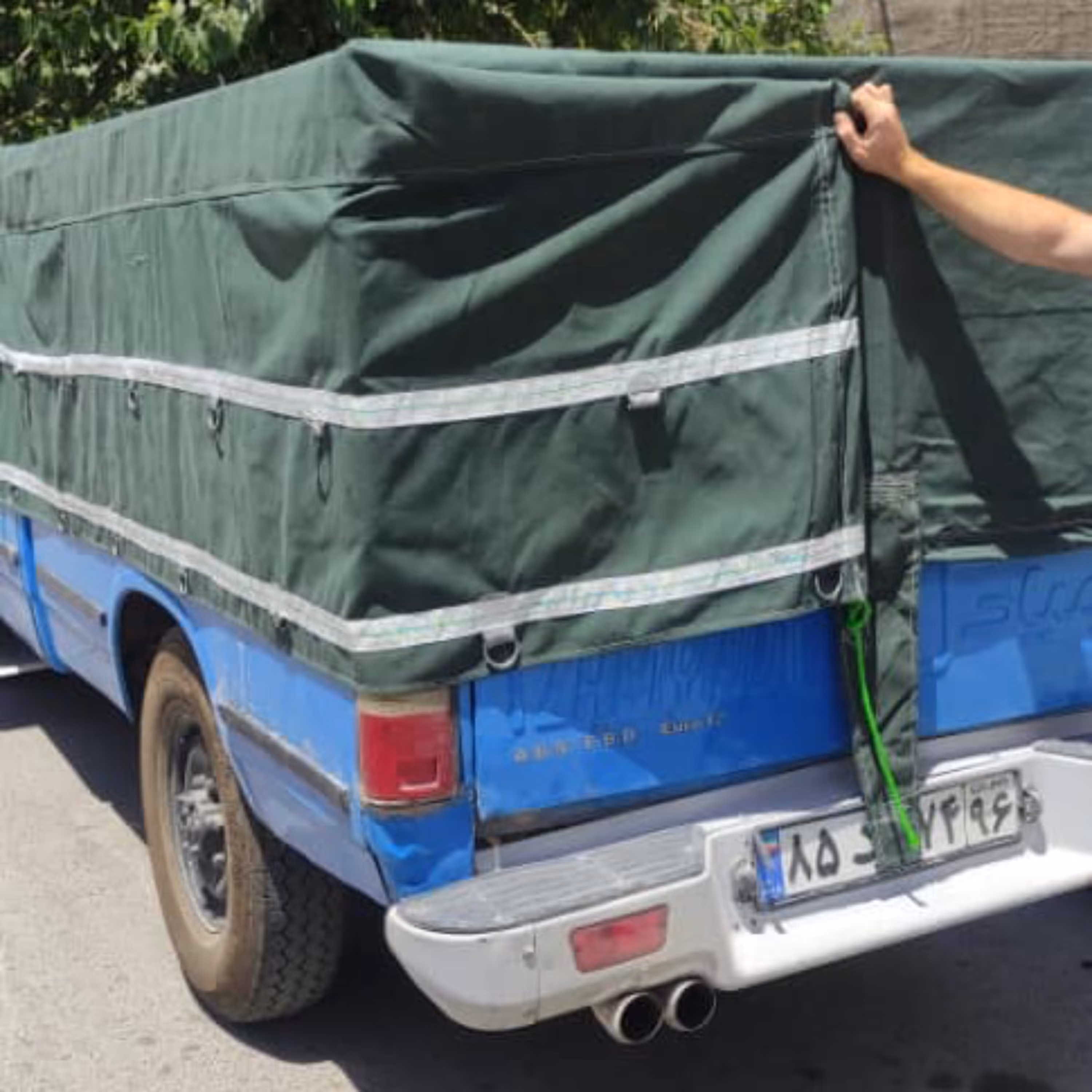 چادر ماشین نیسان برزنتی 9 لایه صد در صد ضد آب با قلاب و دم اسبی سایز 4 در 5 (پسکرایه به عهده مشتری)