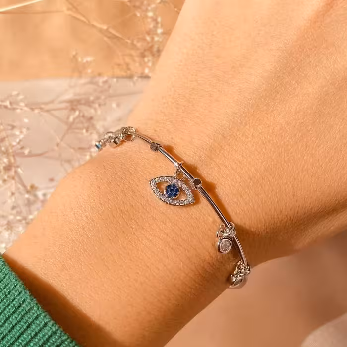 دستبند النگویی مدل چشم نظر و نگین از برند وای اس ایکس