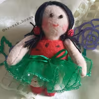 آویز عروسکی دخترک یلدایی هندونه ای برای هدیه در شب یلدا