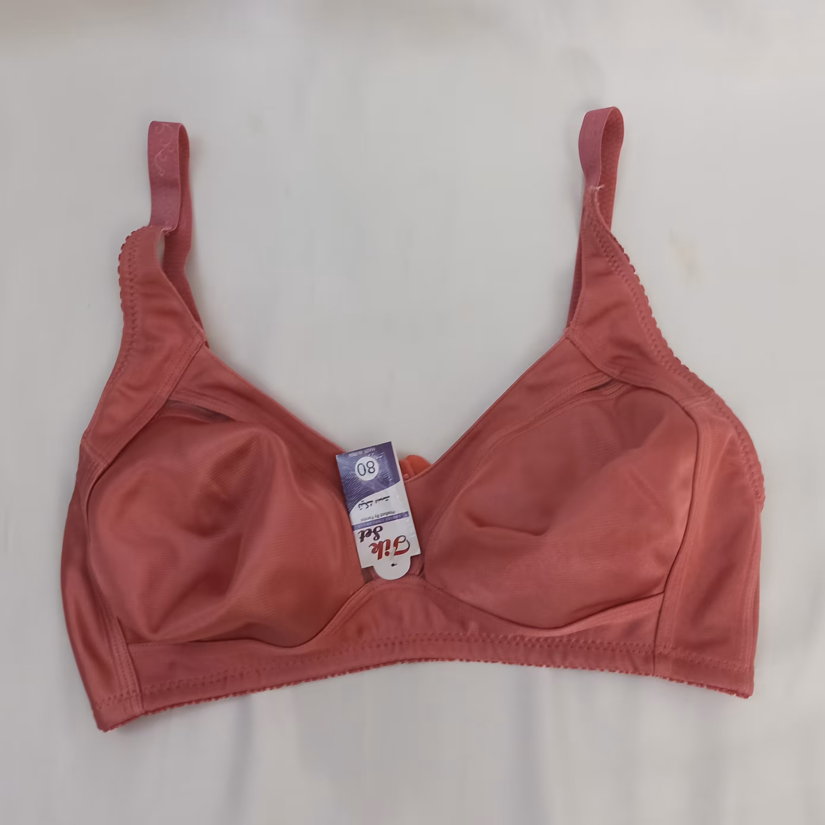 سوتین زنانه راحتی در رنگ های کالباسی تیره و کرم و نارنجی