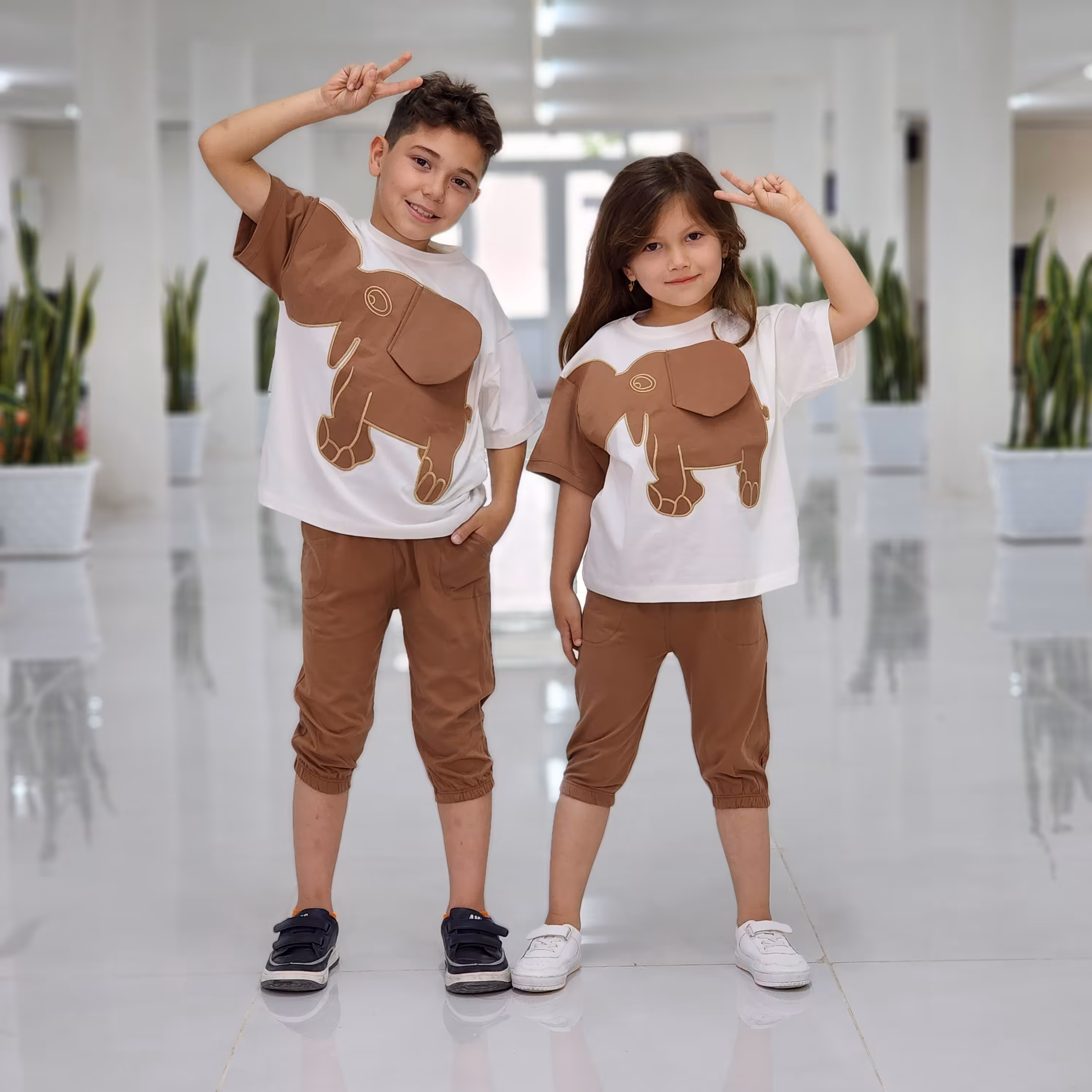 تیشرت شلوارک طرح فیل برجسته این محصول اسپرته مناسب دختروپسر