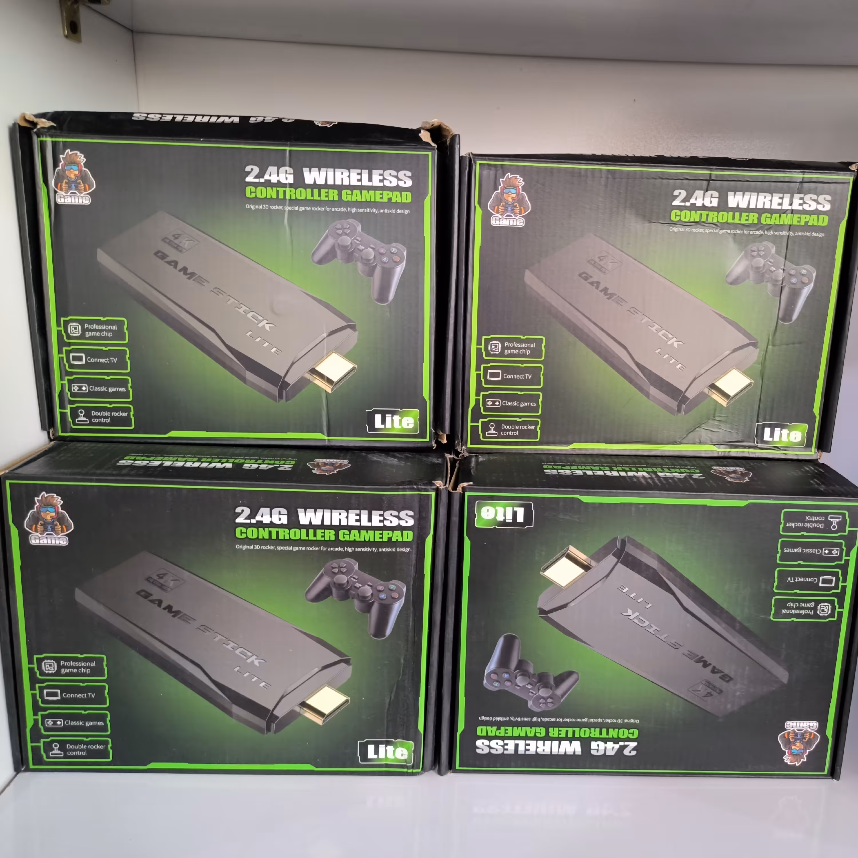 کنسول بازی گیم استیک GAME STICK LITE  اصلی با هدیه 4عدد باطری پاناسونیک رایگان کارتن سبز