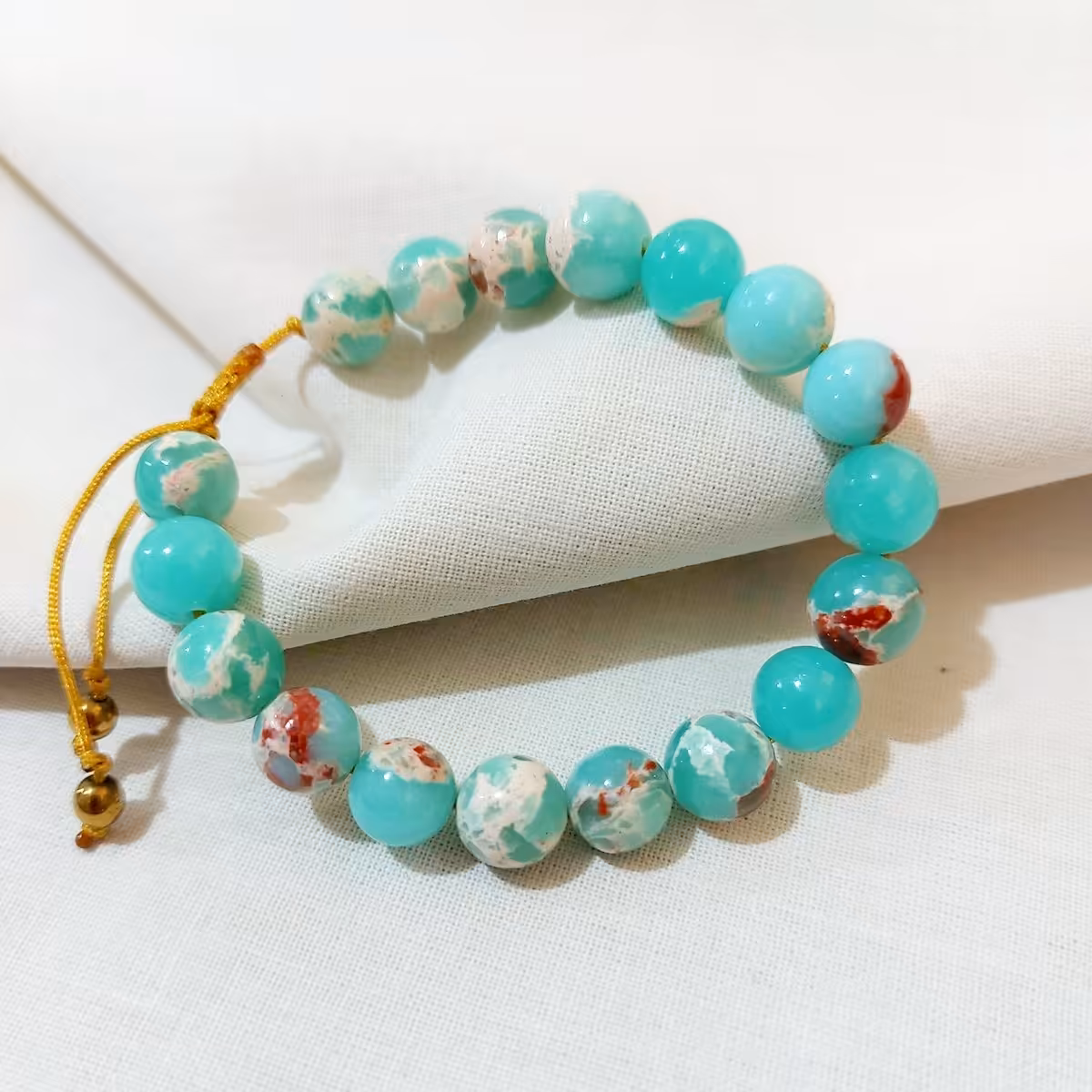 دستبند  سنگ فیروزه آفریقایی خوشرنگ (جاسپر دریایی ) 