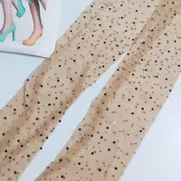 جوراب شلواری پنتی شیشه ای نگیندار مشکی و کرم