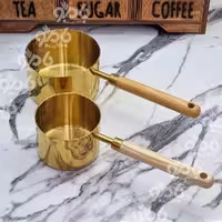 شیر جوش استیل طلایی دسته چوبی