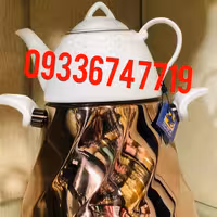 تولیدی کتری قوری هرمی طلایی رامیلا ساخت شرکت تولیدی کتری قوری استیل فراهانی  تولید کننده برتر کتری و قوری استیل در ایران