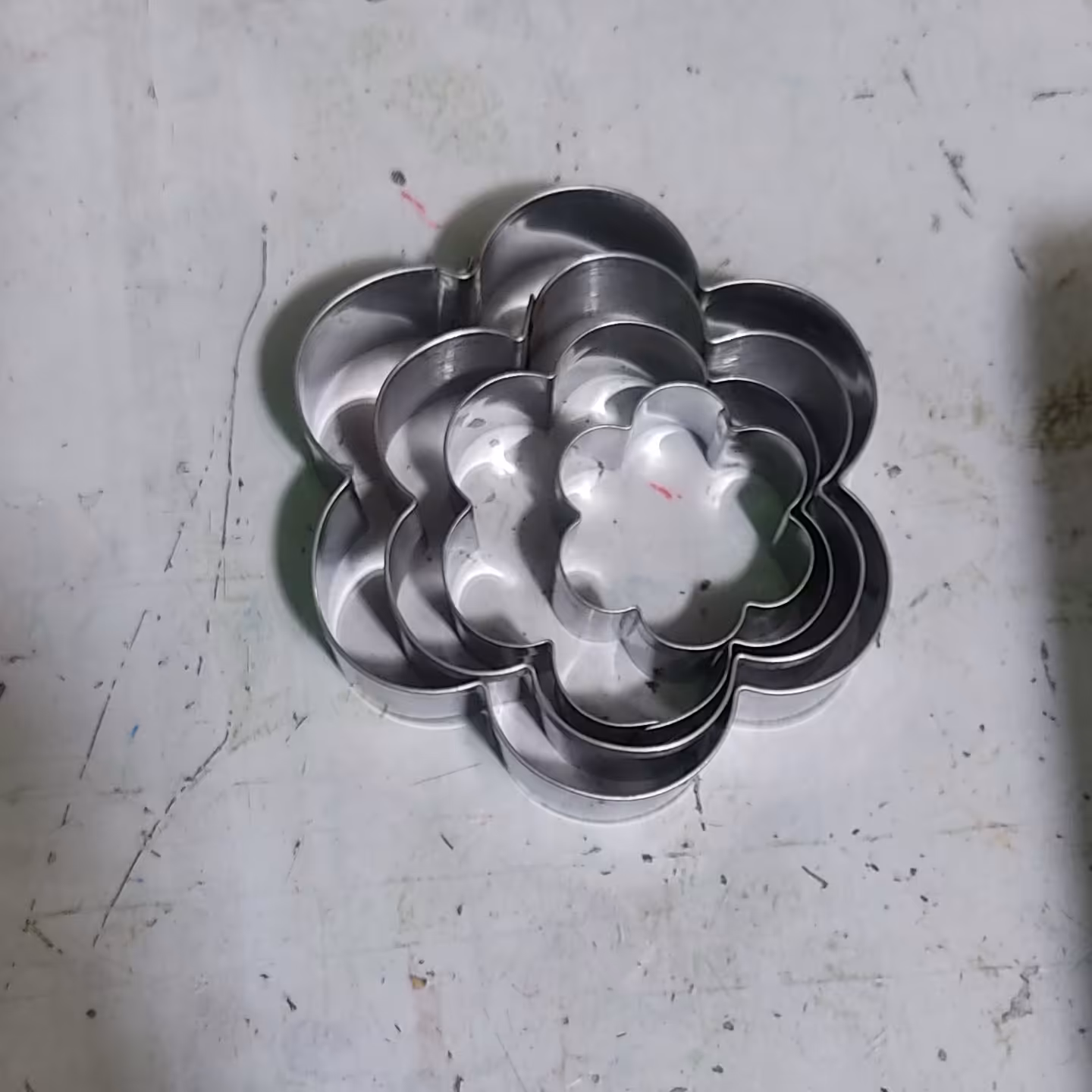 کاتر 4 تایی شش پر استیل قطر های حدودی 4و7و8ونیم و 10 سانت