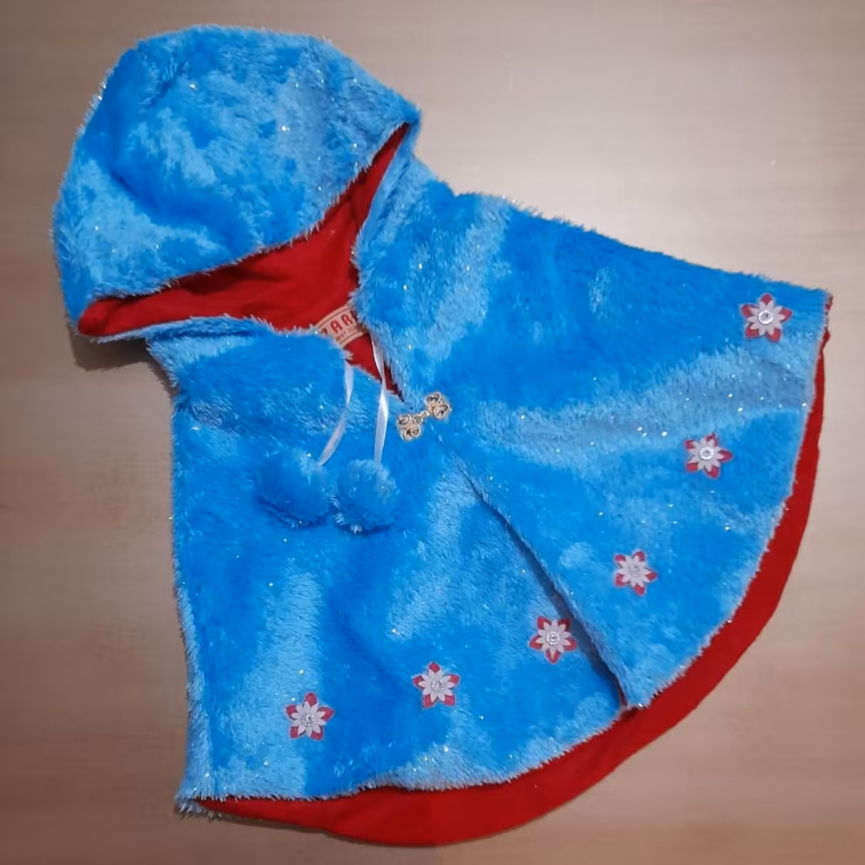 شنل آبی درباری با شکوفه های جذاب پایین کار سایز  40   45   50     برای شازده خانومها