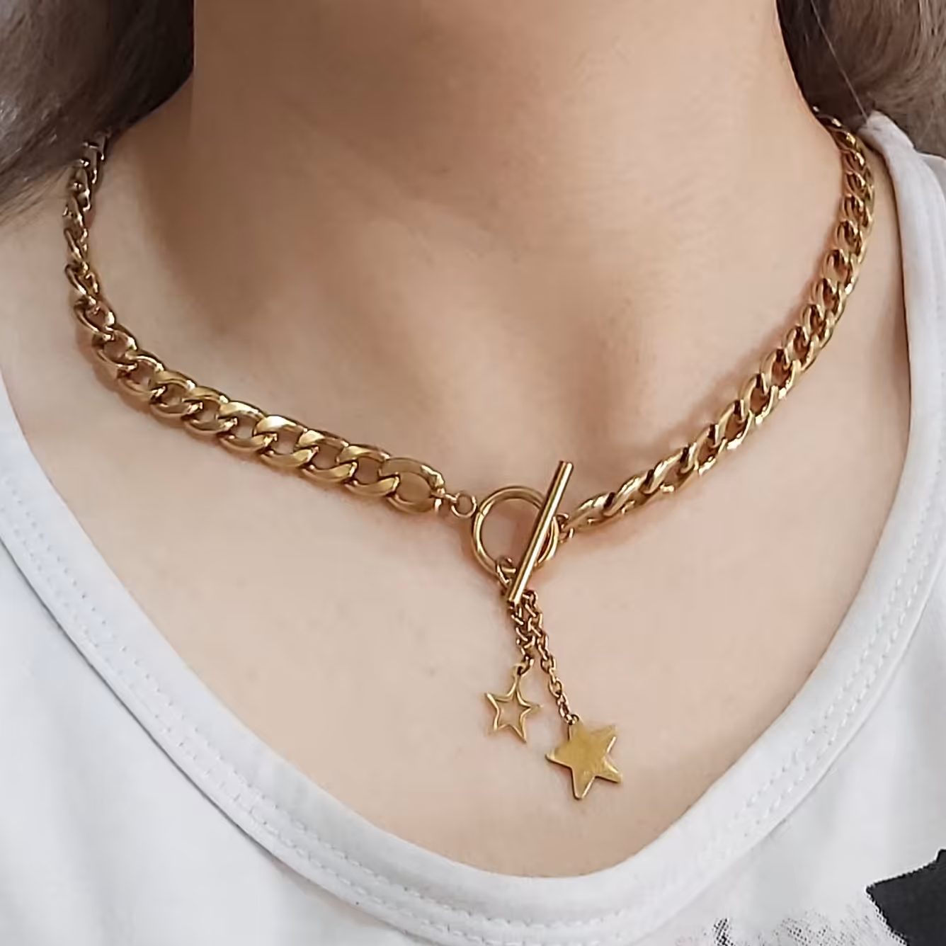 ست گردنبند و دستبند کارتیر با پلاک ستاره طلایی رنگ ثابت