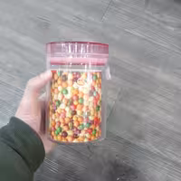 بانکه حبوبات شیشه ای با درب اکرولیک محکم و کیپ برند سی اند اس گنجایش 700 میل 