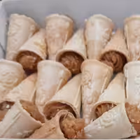 حلوای کاراملی ارائه شده در نان قیفی دوکی شکل به وزن  خالص 329 گرم