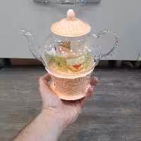 قوری پیرکس شعله مستقیم دارای صافی پیرکس و درب چینی کیفیت پیرکس ضخیم و شعله مستقیم‌با یک وارمر چینی