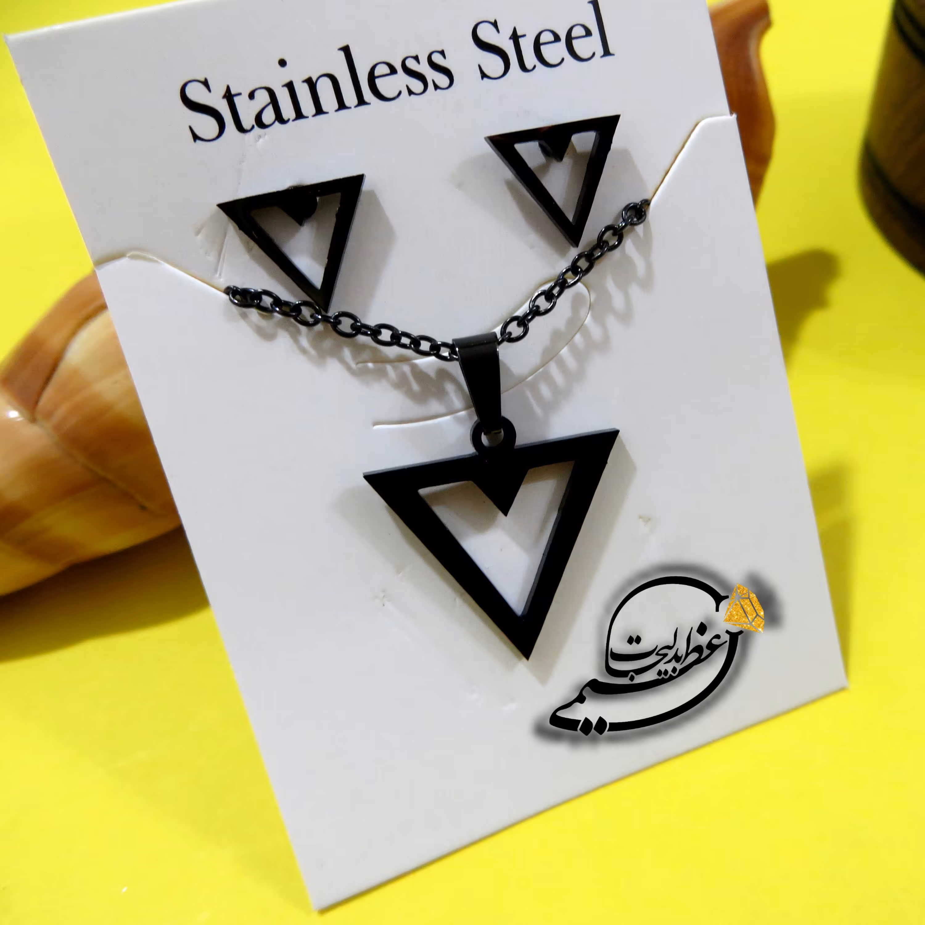 نیم ست مثلث مشکی از جنس استیل رنگ ثابت با آبکاری دو طرفه کد 1