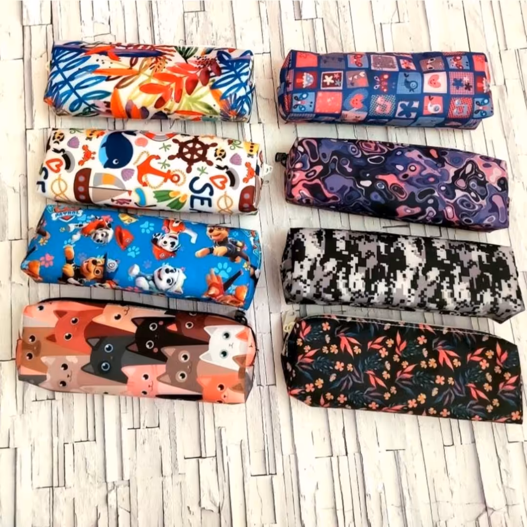 جامدادی تک زیپ پارچه ای .قیمت مناسب.در طرح ها ورنگ های متفاوت