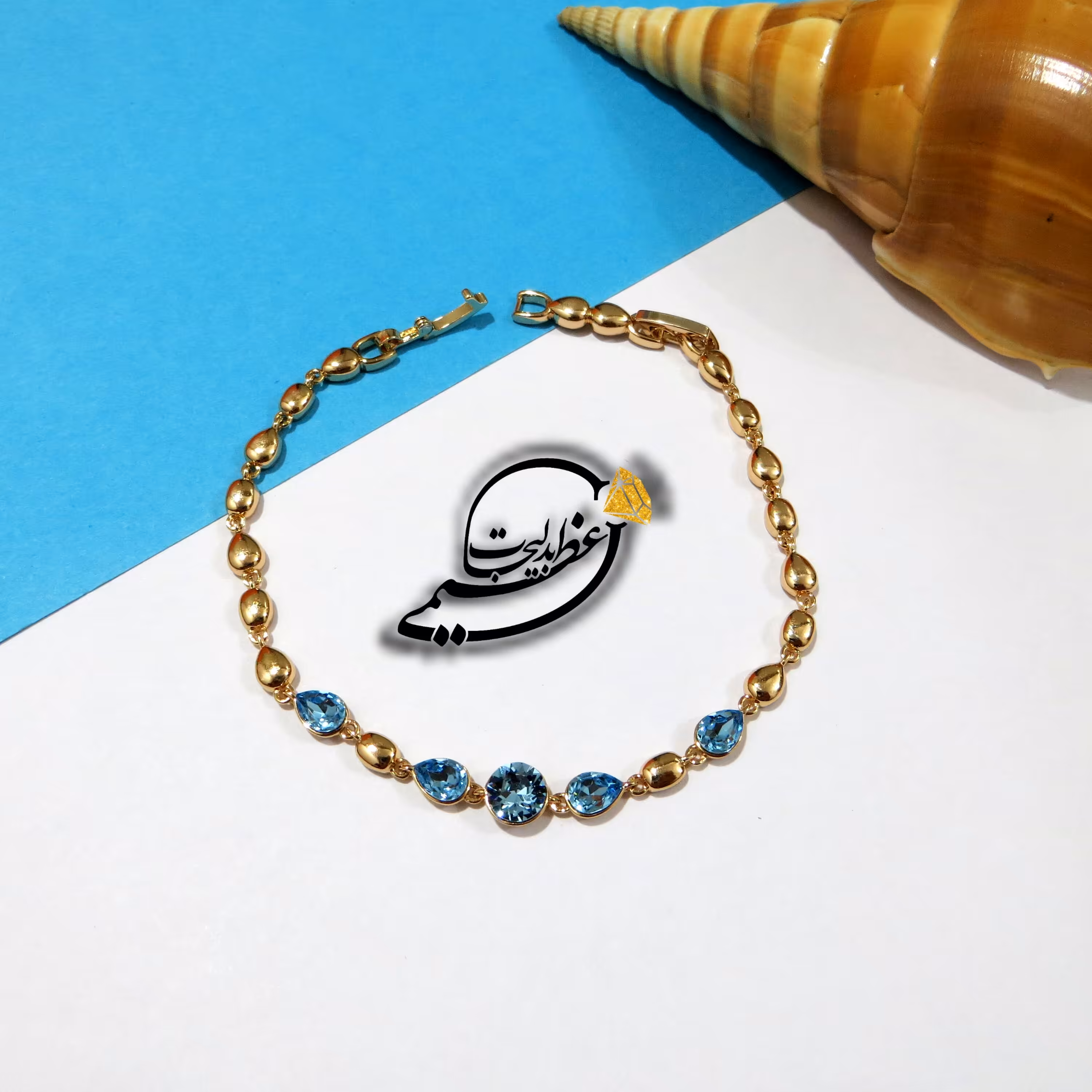 دستبند  نگین کاری آبی مدل 1 شیک و  بسیار زیبای برند Xuping از جنس مس و روکش طلا  و رنگ ثابت و ضد حساسیت کاملا مشابه طلا 