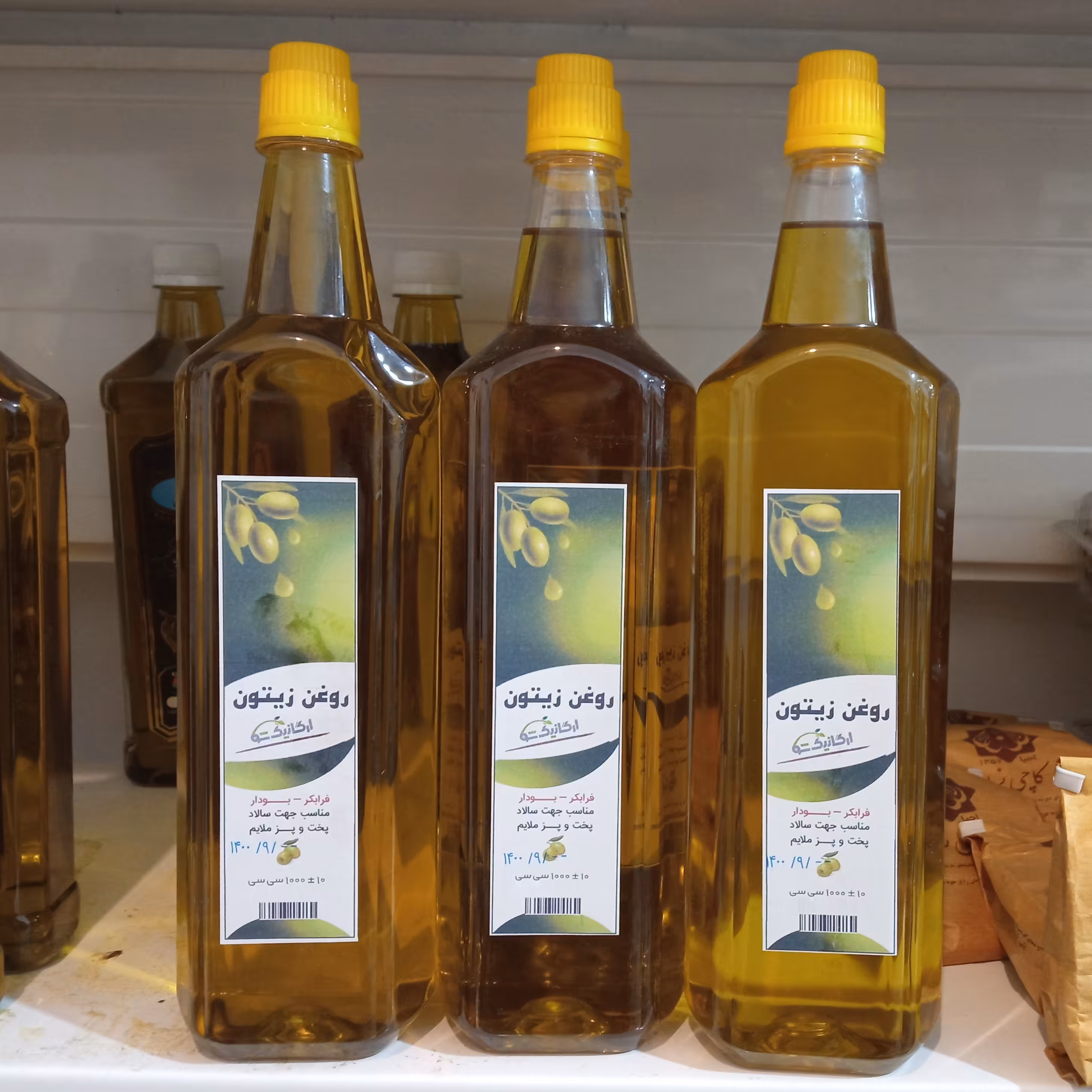 روغن زیتون فرا بکر(بو دار) یک لیتری انجمن طبیعی ایران