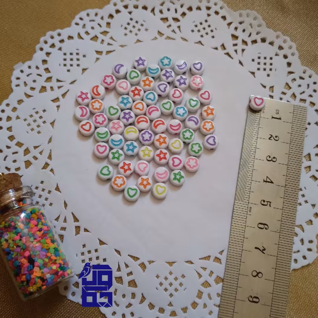 مهره پلاستیکی سفید طرح دار بصورت پک 25 عددی