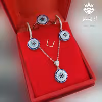 نیمست نقره(با زنجیر و انگشتر) چشم نظر عیار 925اصل و آبکاری طلاسفید  طول زنجیر 45cmهمراه با فاکتور و ارسال رایگان