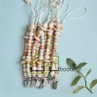 بند پستونک چوبی عروسکی نوزاد هر دو عدد(موجودی بگیرید)