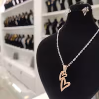 نیمست قلب نقره ای استیل رنگ ثابت ضمانتی همراه زنجیر استیل