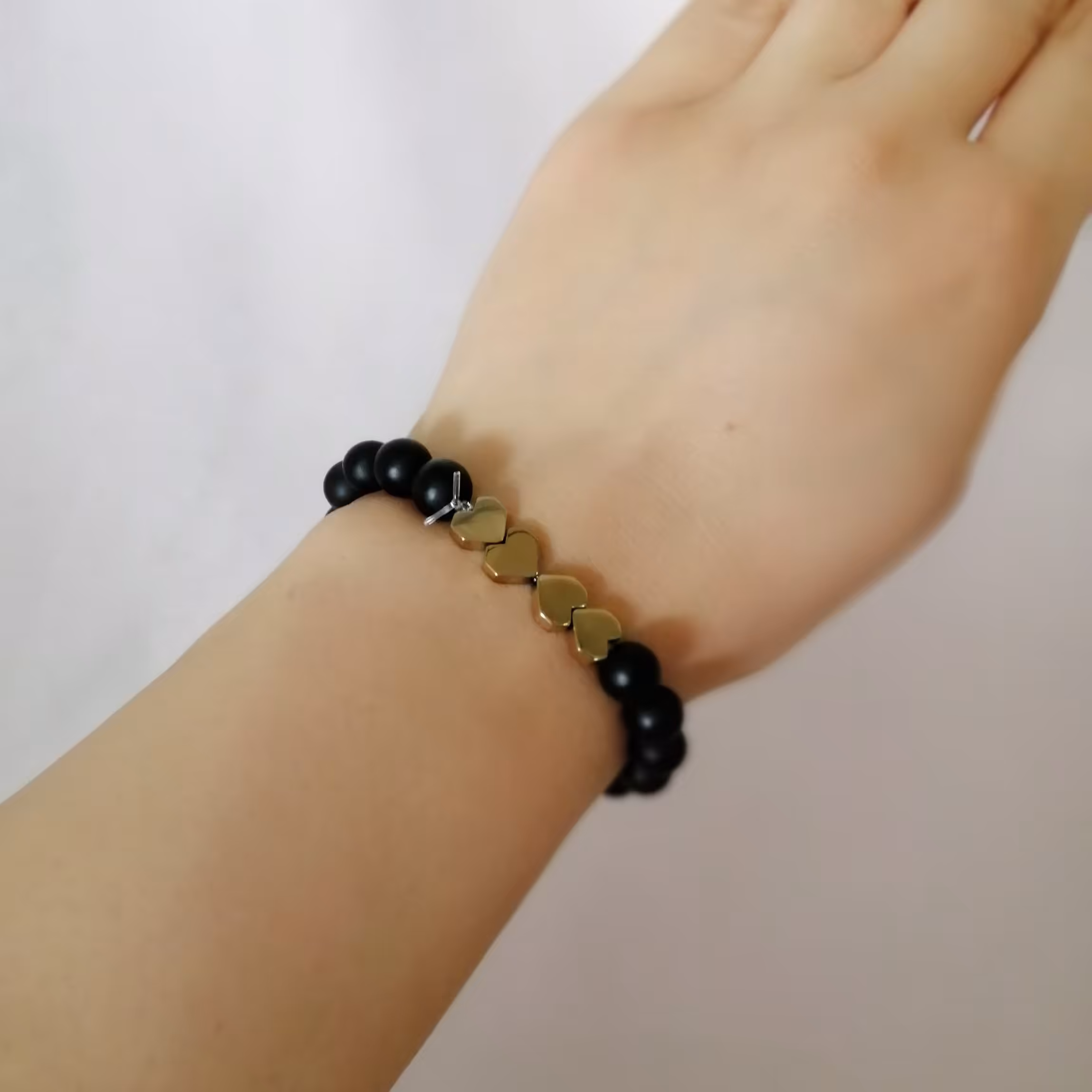 دستبند مهره ای و حدید طلایی