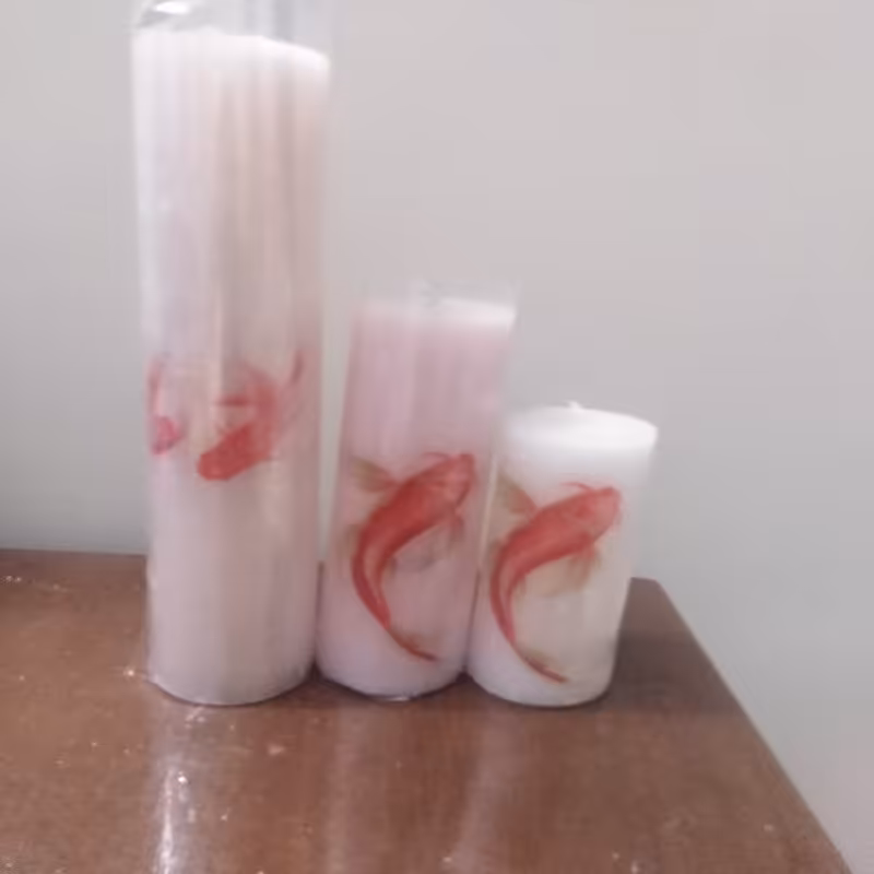 پک شمع استوانه ای طرح ماهی در سه سایز کوچک متوسط و بزرگ