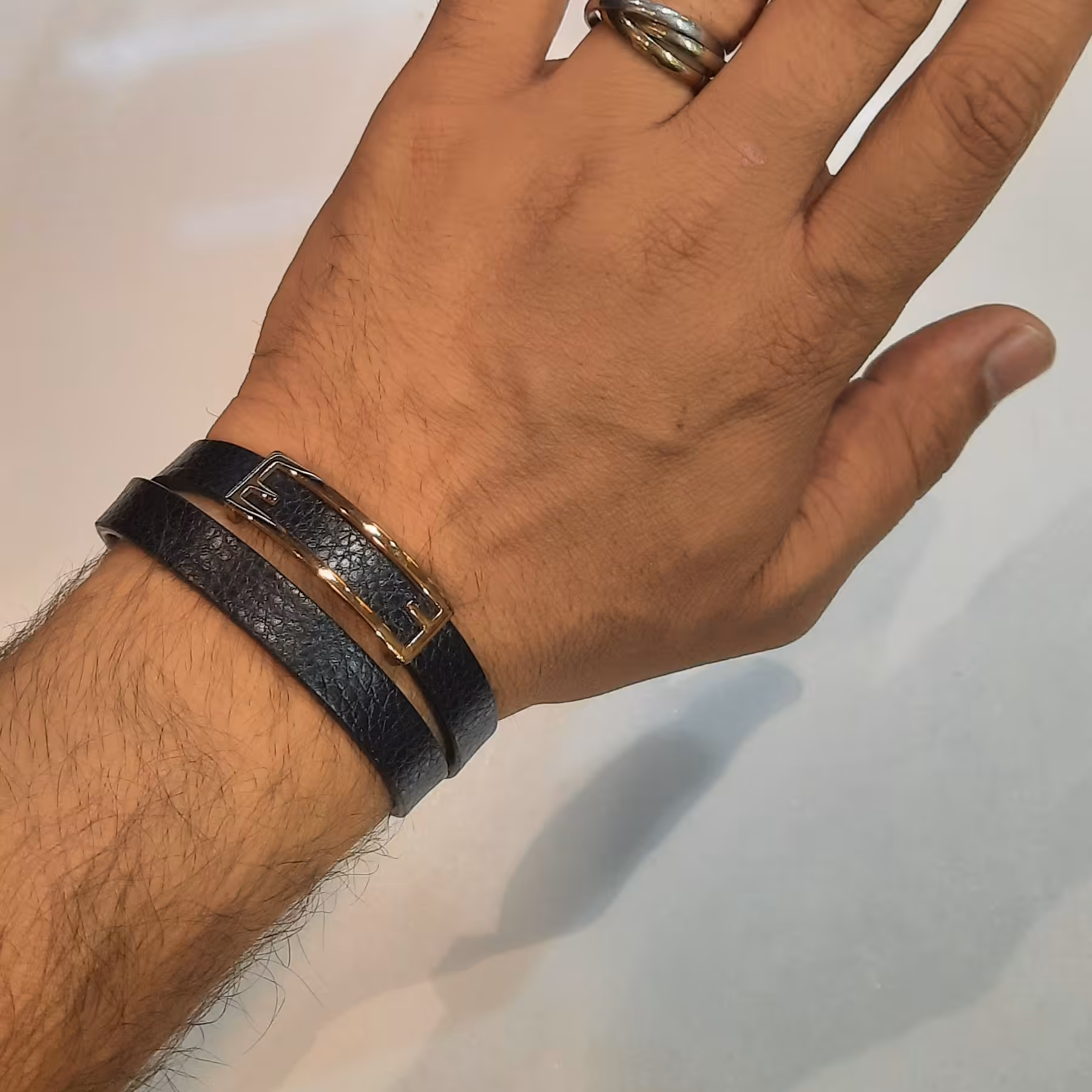 دستبند چرم و استیل برند کارتیر 