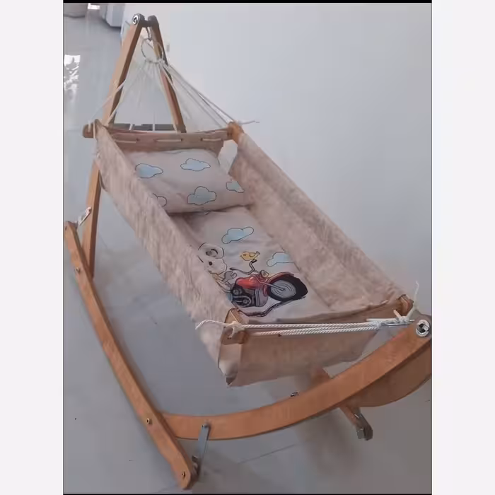 ننو نوزاد چوبی گهواره نوزاد چوبی دارای رنگبندی