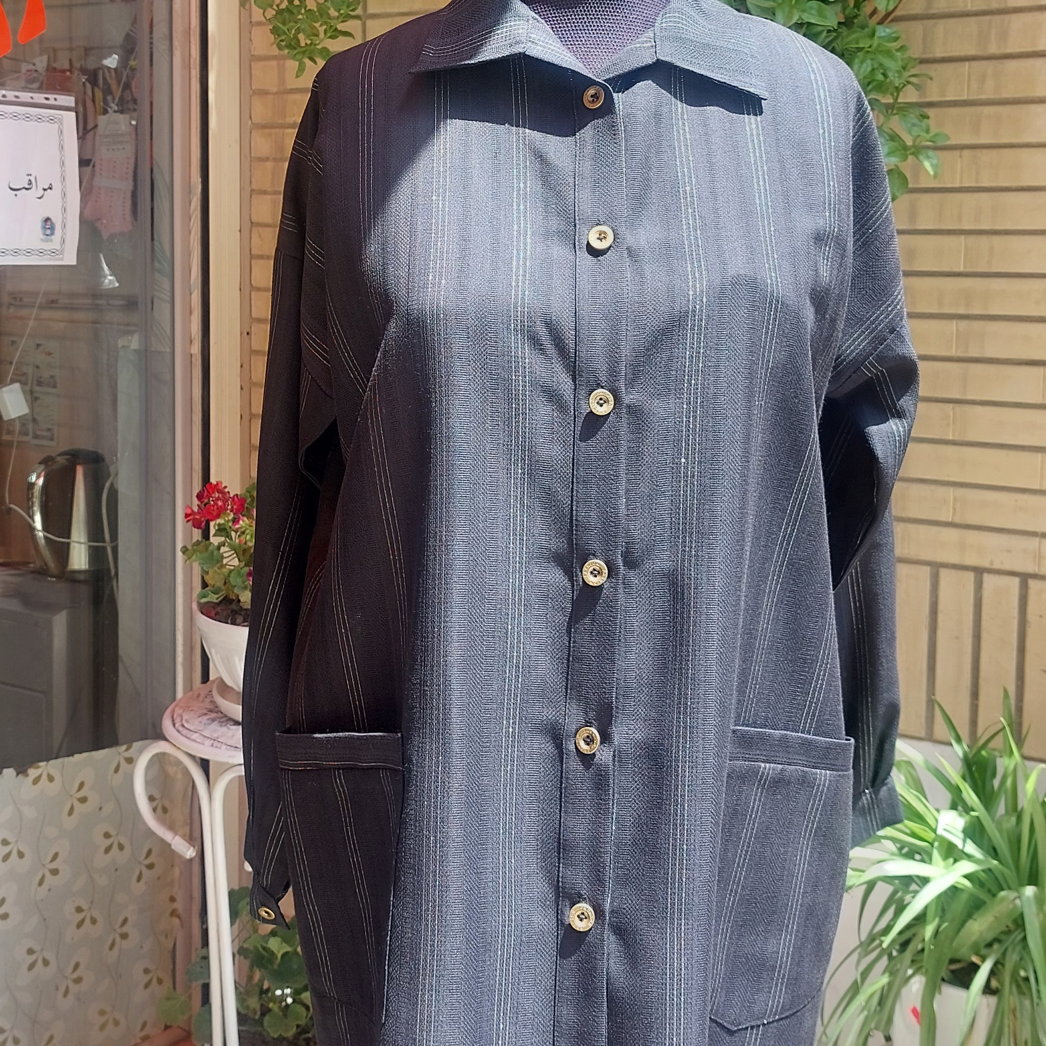 مانتو مشکی لمه دار 