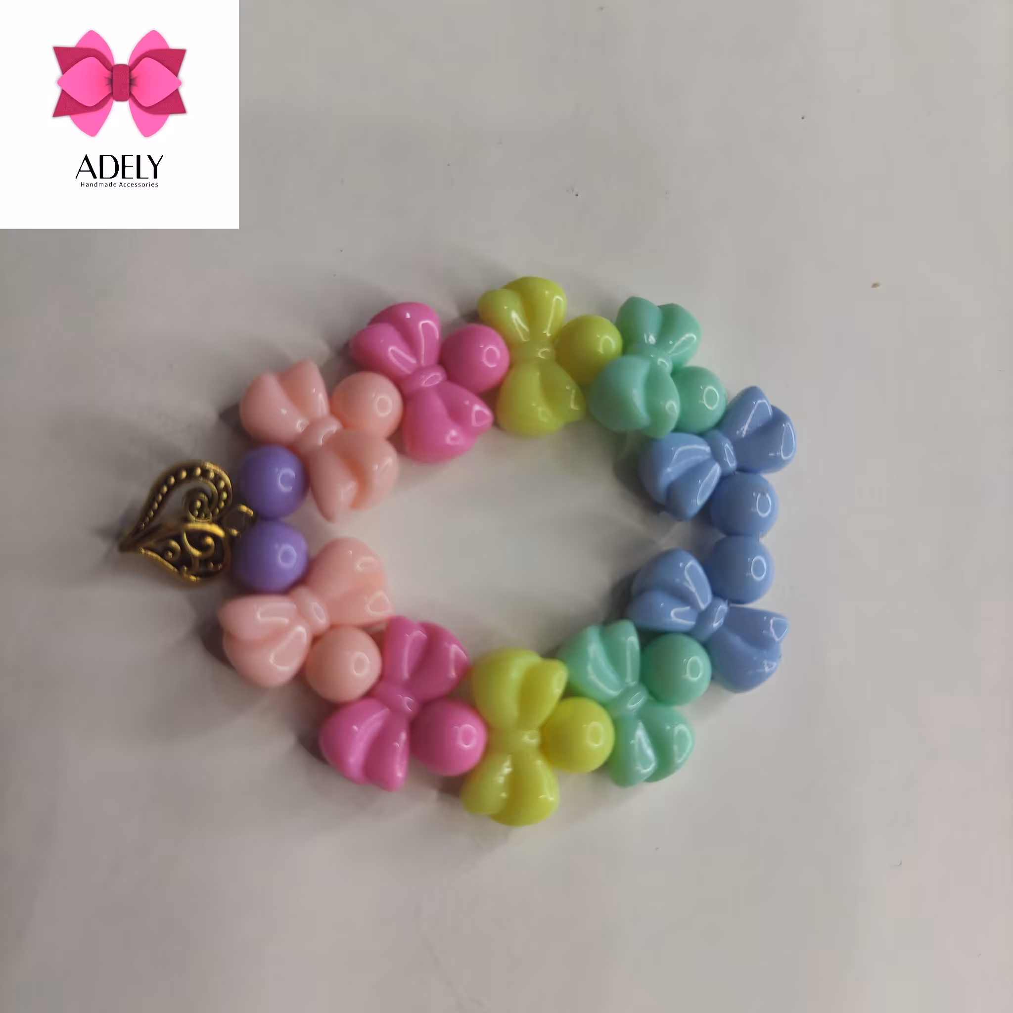 دستبند با مهره های  پاپیون و آویز قلب کد 400