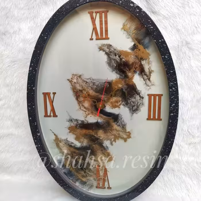 ساعت دیواری مدل بیضی ابر و باد