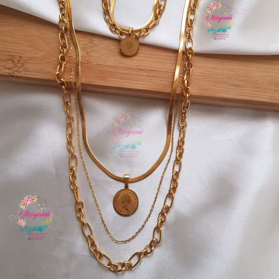 ست گردنبند و دستبند 3لاینی استیل و رنگ ثابت طلایی با اویز الیزابت فول استیل میتونید بصورت دائم استفاده کنید