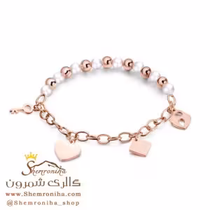 دستبند مروارید تیفانی آویز قلب و کلید و اشکال رزگلد BNG353R0
