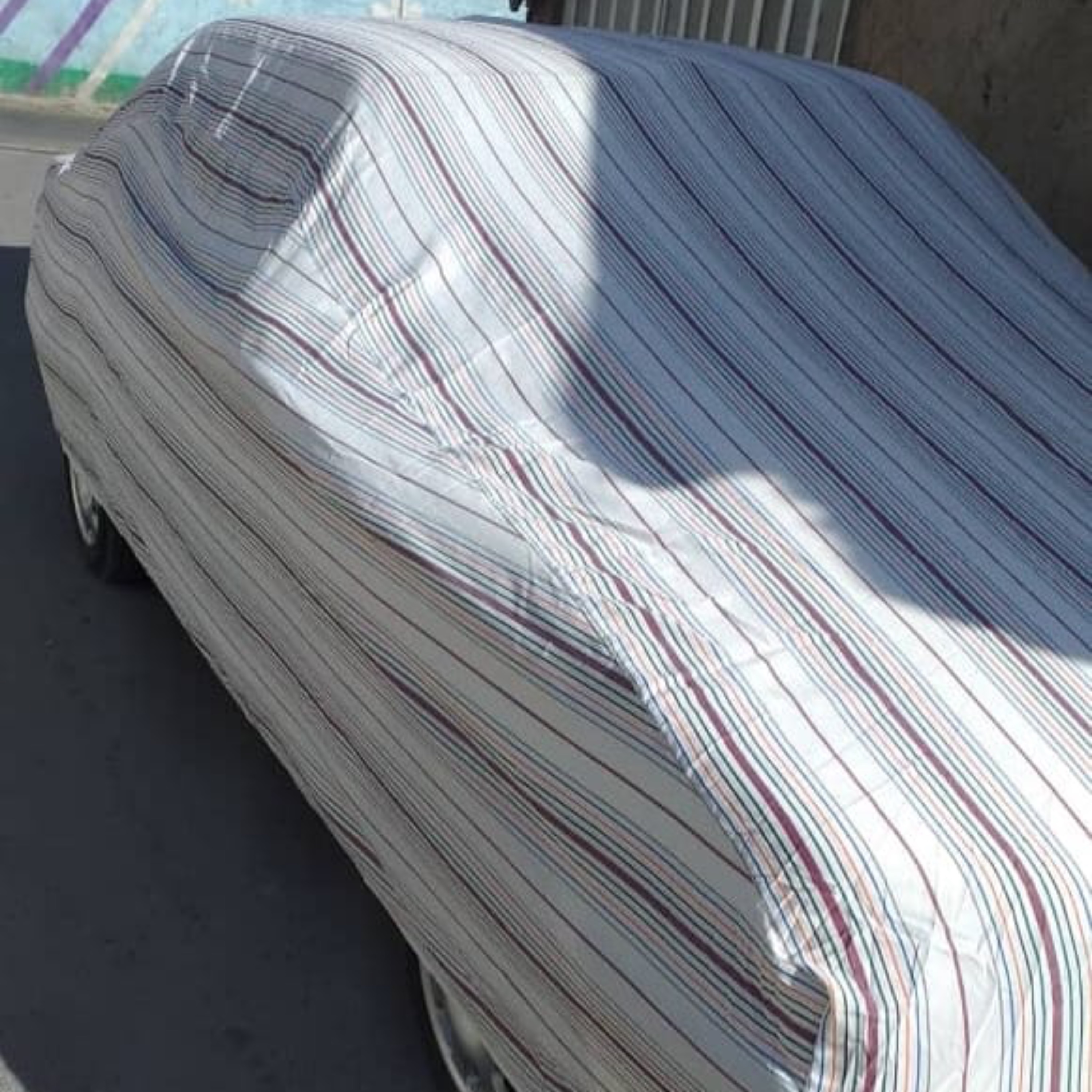 چادر نخ پنبه درجه یک تبریز ضد آفتاب سایز L برای 405 سمند دنا زانتیا  پسکرایه به عهده مشتری 