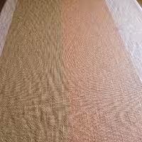 پارچه پرده ای گونی بافت ایرانی عرض 1.5 متر طلایی مات و صورتی و طوسی (پس کرایه)