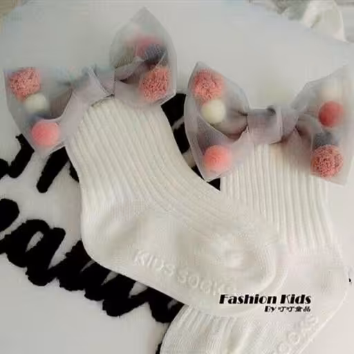 جوراب بچه گانه پاپیوندار توپی