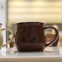 ماگ سرامیکی مارک رجینال گنجایش 300 رنگ قهوه ای طرح فنجان قهوه