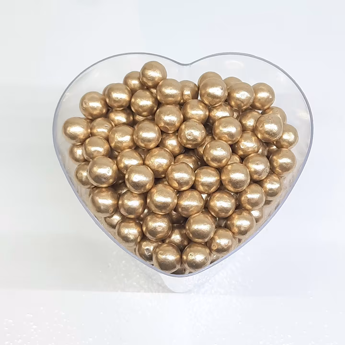 مروارید خوراکی تزئینی رنگ طلایی سایز چهار 