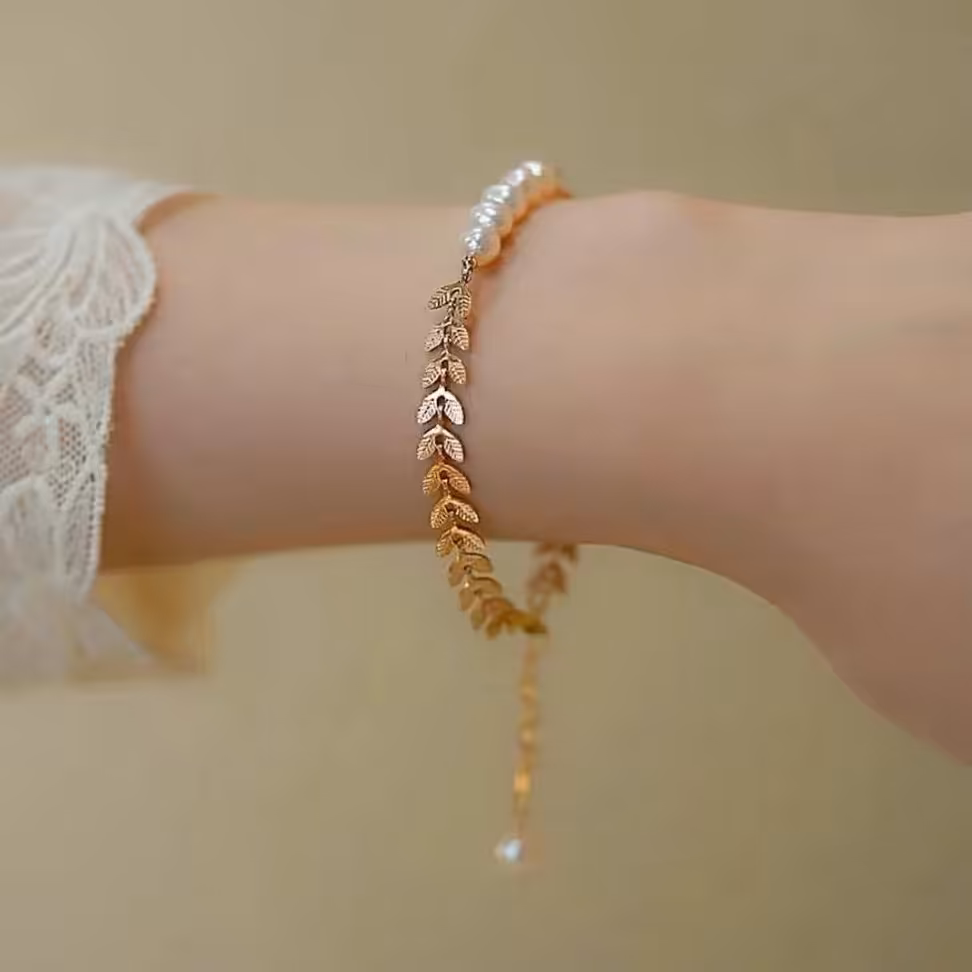 دستبند گندمی استیل ابکاری طلا با مروارید  پرورشی اصلی