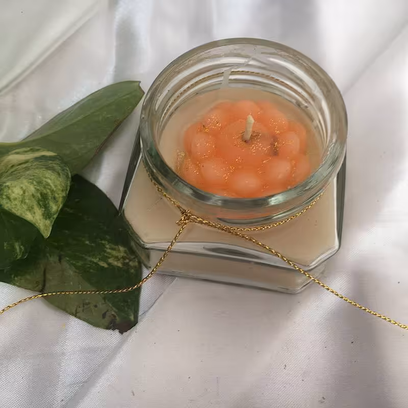 شمع شیشه ای 4ضلعی معطر 