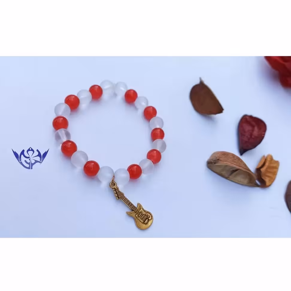 دستبند گیتار ساخته شده از سنگ اونیکس و خرجکار طلایی