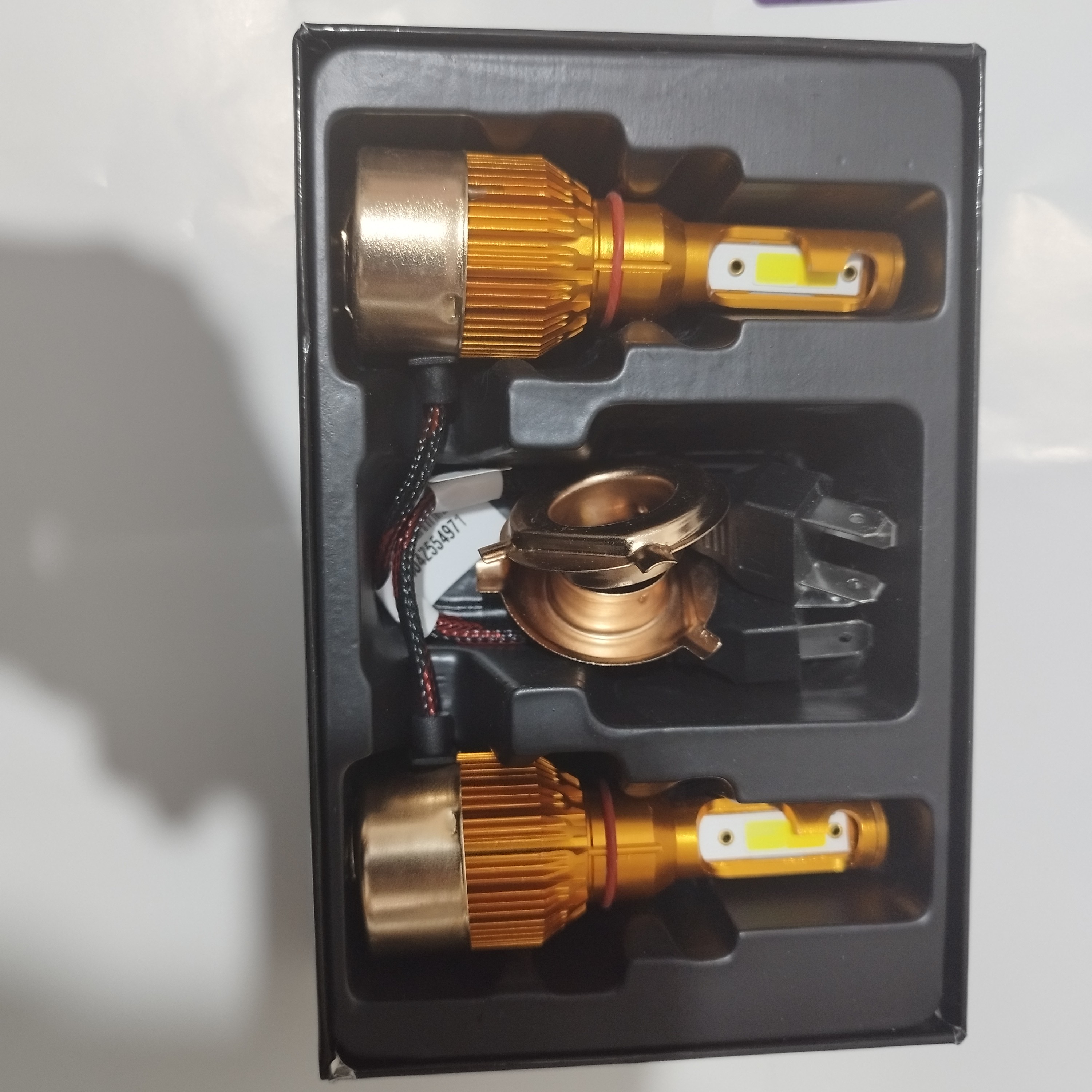 هدلایت خودرو h4 سه رنگ فلش زن بسته دو عددی H4