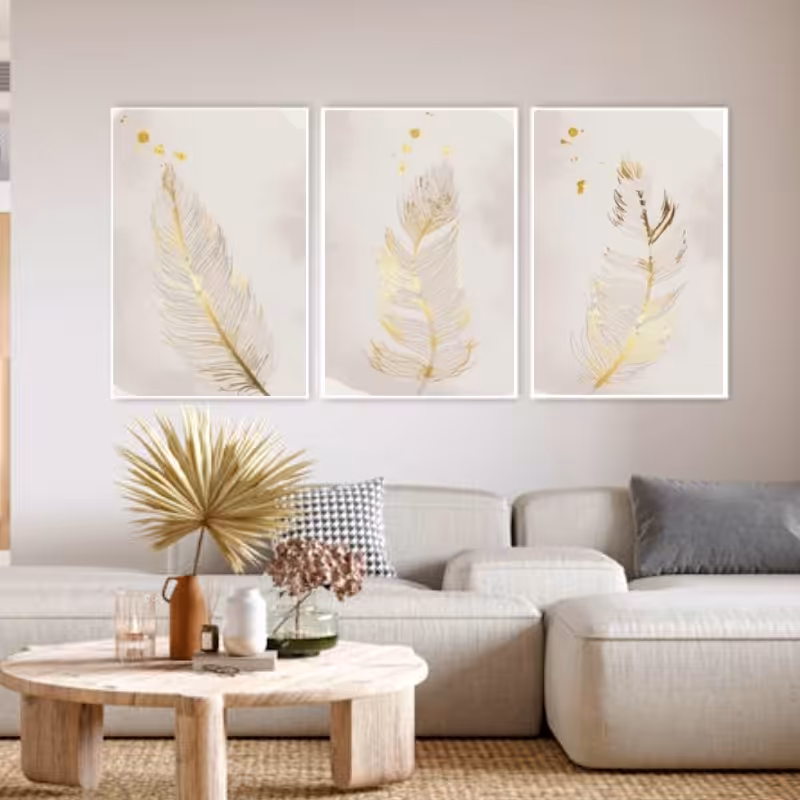 تابلو دکوراتیو فانتزی طرح پر طلایی وزمینه سفید سه تکه هر تکه60در40 