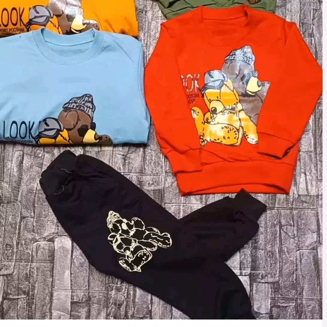 بلوز شلوار دخترانه و پسرانه طرح خرس و زرافه در پنج رنگ سایز 40 تا 55